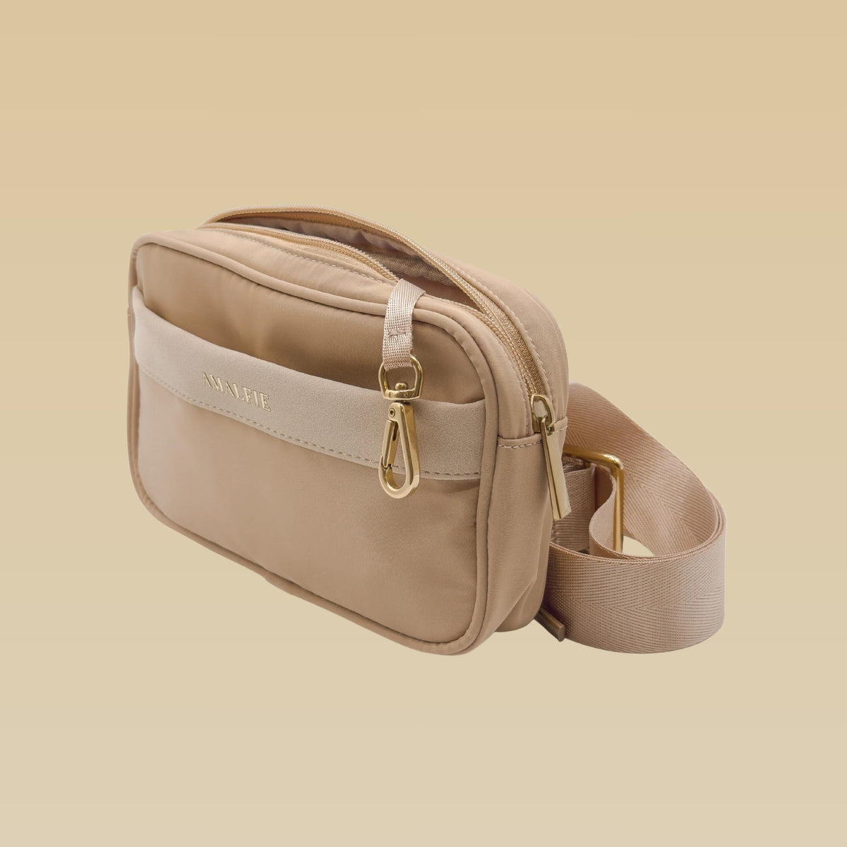 Coastal Beige dog walking bag side view with brass accessory hook, partly unzipped